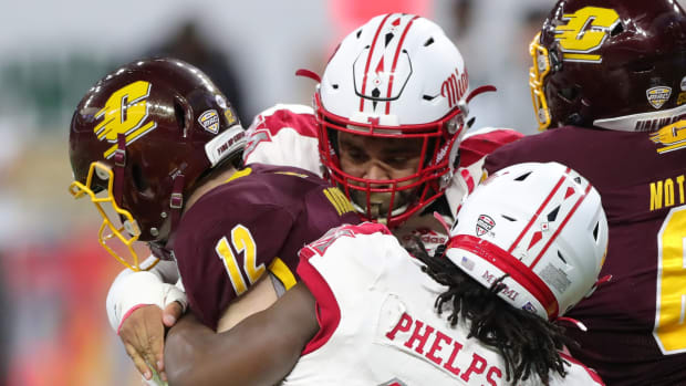Miami (Ohio) RedHawks defensive lineman Lonnie Phelps sacks Central Michigan Chippewas quarterback Quinten Dormady during the first half of the MAC championship game Saturday, Dec. 7, 2019 at Ford Field in Detroit. Mac